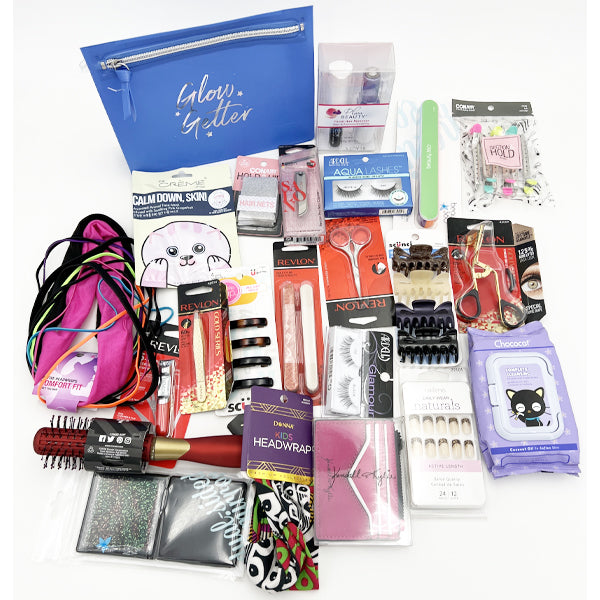 A Deal Society Beauty/Makeup Tools Mixed Lot (40 pcs) featuring Beauty 360 and more, includes hair and nail care accessories, headbands, false eyelashes, plus a blue Glow Getter pouch—all arranged on a white surface.